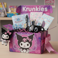 Krunkies product box with stationery items and a character figurine on a table.